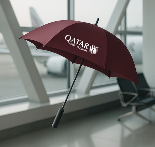 Qatar Airways branded umbrella printed at the airport